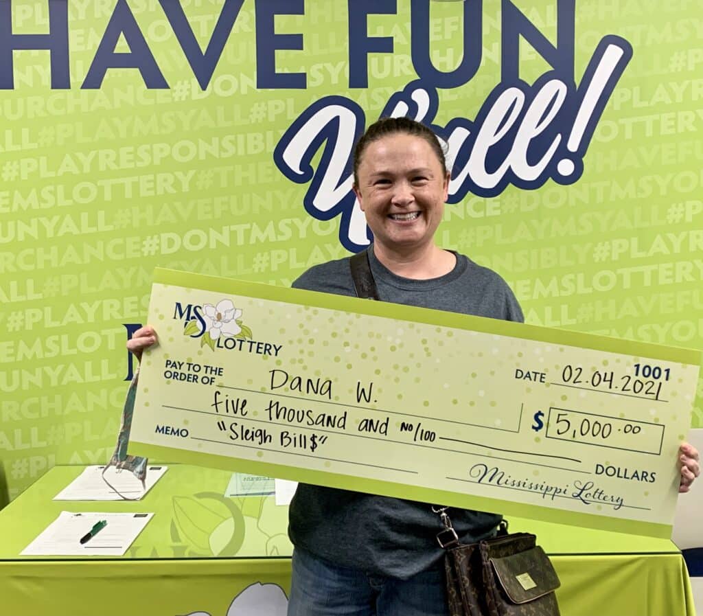Dana W. of Magnolia won $5,000 on a Sleigh Bill$ scratch-off game purchased from B-Kwik 14 on E. Main St., Liberty.